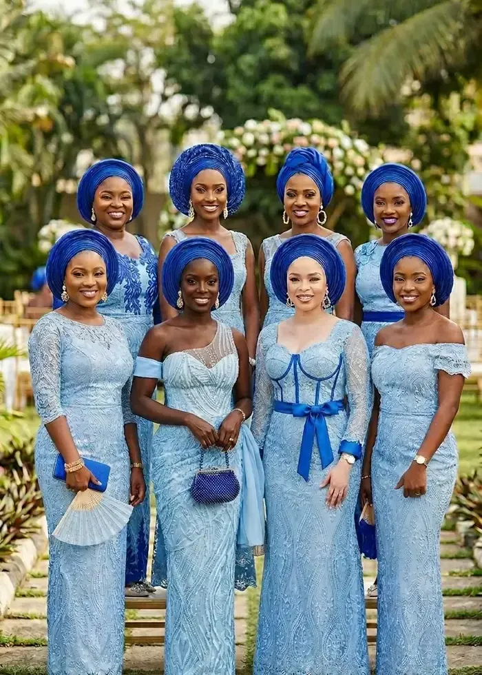 A group dressed in matching aso-ebi for a wedding celebration